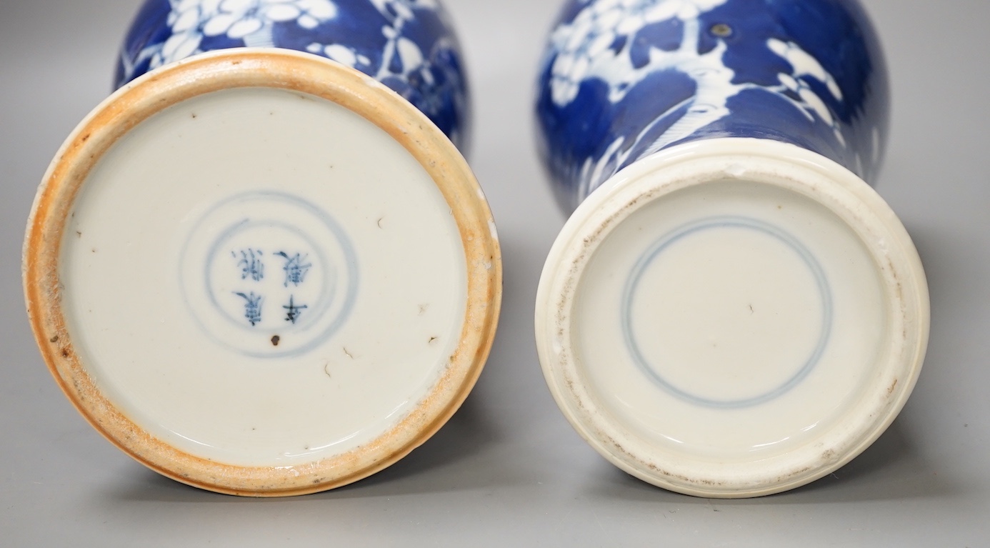 Two 19th century Chinese blue and white prunus vases, 31cm